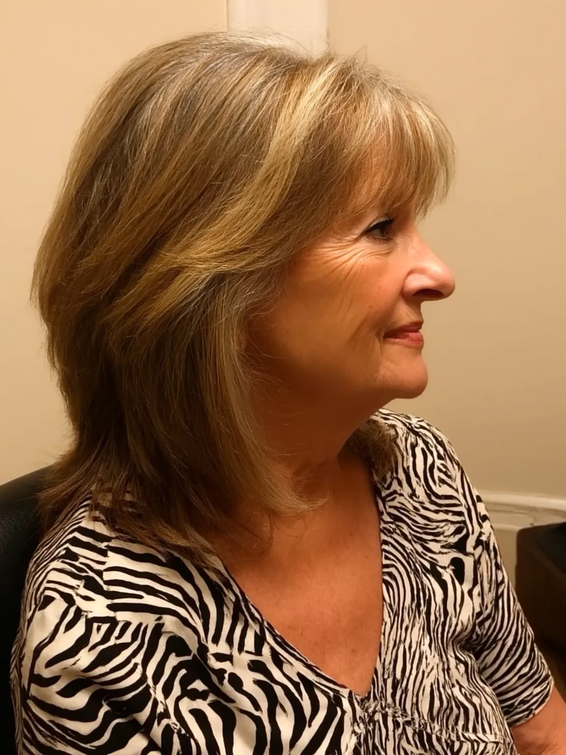 Shoulder-Length Layered Bob with Warm Honey Highlights